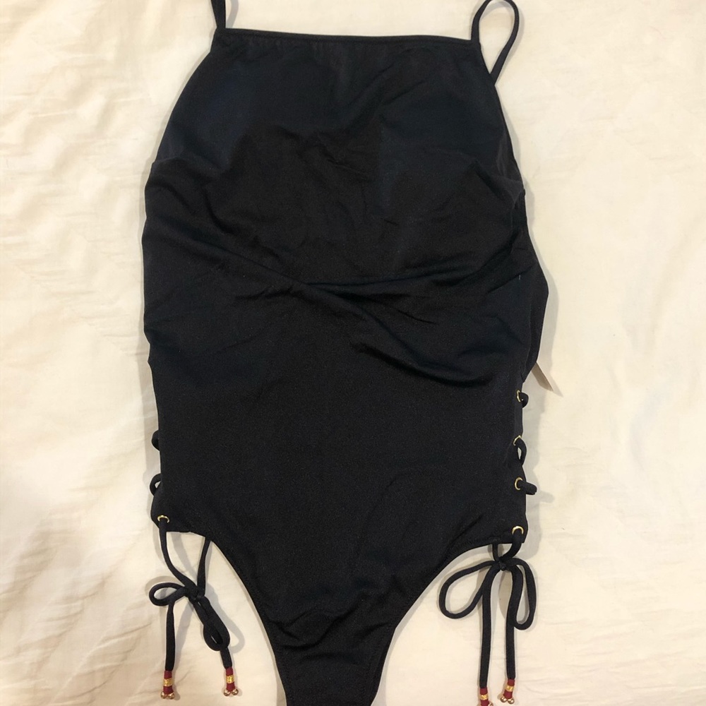 NWT one piece with side ties